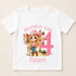 A white t-shirt with a cartoon image of a young girl wearing a cowboy hat and standing next to a horse, along with the text "Birthday Girl 4 Payten".
