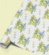 Personalised dinosaur birthday wrapping paper featuring cute blue and green dinosaurs, custom name, tropical trees and dinosaur footprints.