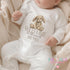 Children's clothing with the welcome to the world bunny baby vest design