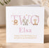 A personalized birthday card for a girl named Elsa, featuring illustrations of a lion, elephant, and giraffe.