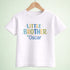 A white t-shirt with a colorful text design that says "Little Brother Oscar" printed on it.