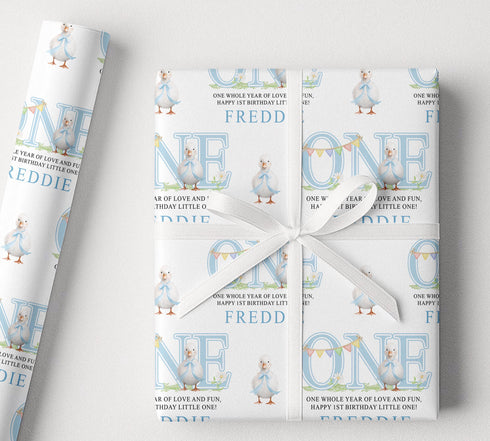 Personalised blue duck first birthday wrapping paper with custom name, one birthday theme, pastel blue design and cute duck illustrations.