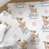 Personalised Christmas wrapping paper featuring a cute baby deer with pink scarf, custom name and festive snowflake design, Christmas gift wrap.