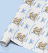 a blue and white wrapping paper with a picture of a teddy bear