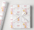 Personalised 1st birthday wrapping paper with pink duck design, custom name and relation, large number 1, balloons, bunting and bow details.