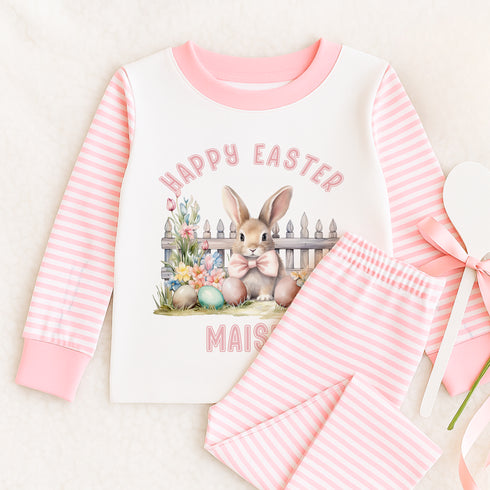 a pink and white shirt with a bunny on it