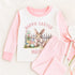 a pink and white shirt with a bunny on it
