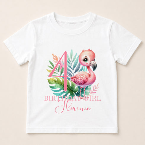 A white t-shirt with a pink flamingo and tropical leaves printed on it, along with the text "BIRTHDAY GIRL Florence" printed below.