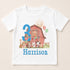 A white t-shirt with a colorful illustration of a barn, farm animals, and a number 3.