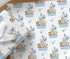 a repeating pattern of cartoon animal illustrations, including elephants, giraffes, and lions, along with the name "Ronnie" and the number "1" printed on the wrapping paper.