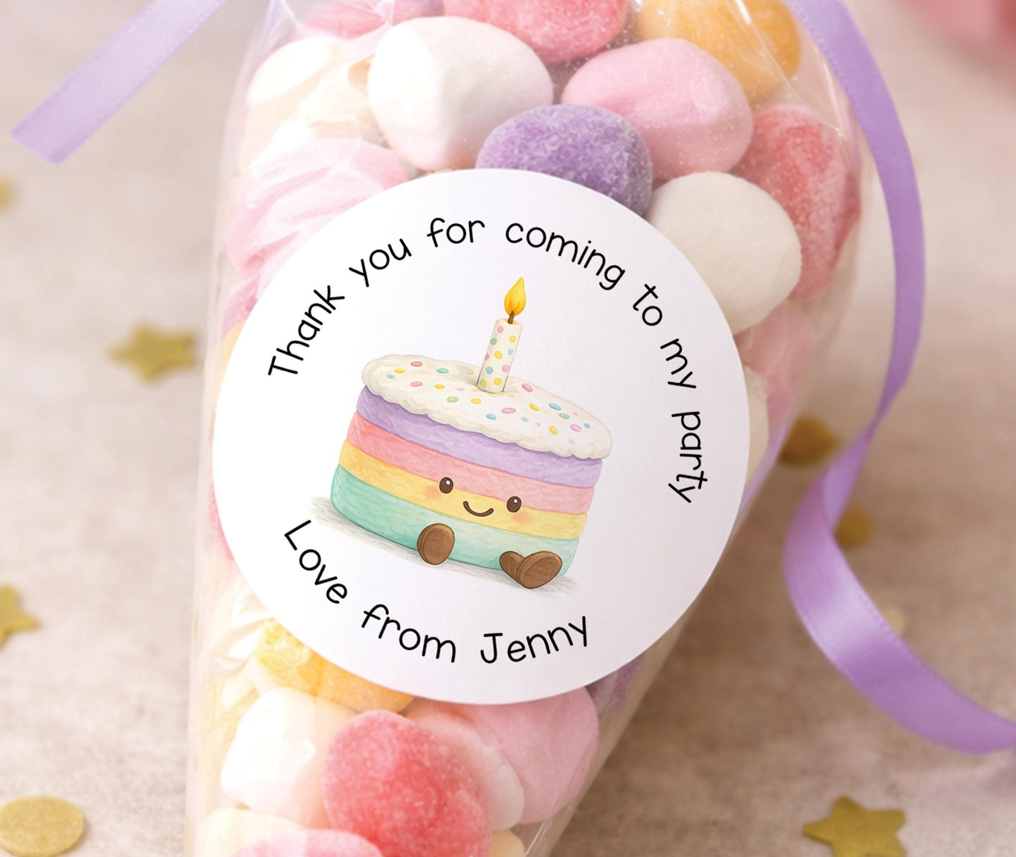 Sheet of glossy rainbow cake birthday stickers, personalised with a child's name, ready for party bags