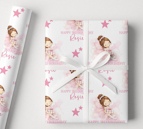 Personalised birthday wrapping paper with pink fairy design, custom name and age, pink stars, soft watercolour details and pretty birthday wording.