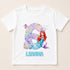 A white t-shirt with a design featuring a mermaid character and the number 6.