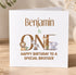 A personalized birthday card for Benjamin, who is turning one. The card features a design with the word "Benjamin" made up of various animal illustrations, including a lion, zebra, giraffe, and elephant. The card also includes a message that reads "Happy Birthday to a special brother".
