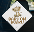 a sticker with a cartoon lion and the text "BABY ON BOARD".