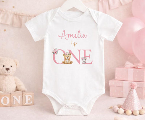Children's clothing with the first birthday pyjamas design