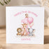 A personalized first birthday card for a baby girl named Leonna, featuring illustrations of a lion, giraffe, elephant, and a monkey.