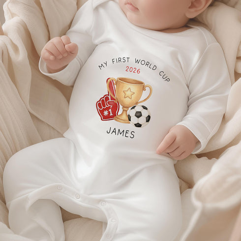 Personalised My First World Cup 2026 baby sleepsuit with football trophy and foam finger design, custom football romper