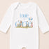 A white onesie with a personalized text and illustrations on it.