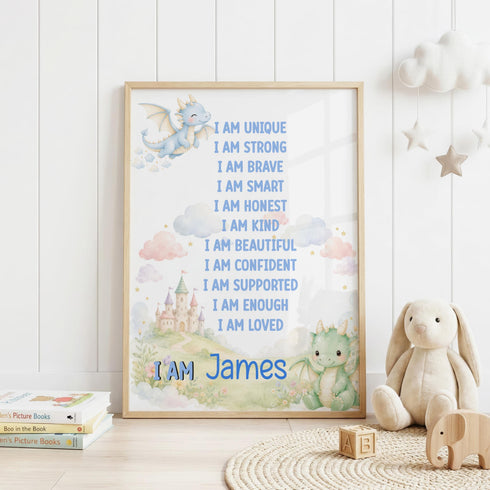 a framed poster with a list of personal qualities, including "I am unique", "I am strong", "I am brave", "I am smart", "I am honest", "I am kind", "I am beautiful", "I am confident", "I am supported", "I am enough", and "I am loved". The poster is displayed on a white wall, with a stuffed rabbit and a wooden elephant nearby, and a stack of books on the floor.