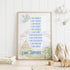 a framed poster with a list of personal qualities, including "I am unique", "I am strong", "I am brave", "I am smart", "I am honest", "I am kind", "I am beautiful", "I am confident", "I am supported", "I am enough", and "I am loved". The poster is displayed on a white wall, with a stuffed rabbit and a wooden elephant nearby, and a stack of books on the floor.