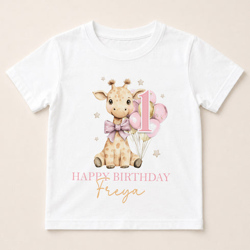 A white t-shirt with a giraffe and balloons printed on it, along with the text "Happy Birthday Freya".