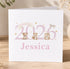 A white greeting card with a personalized message and illustrations of three cute animals, including a deer, a hedgehog, and a rabbit.