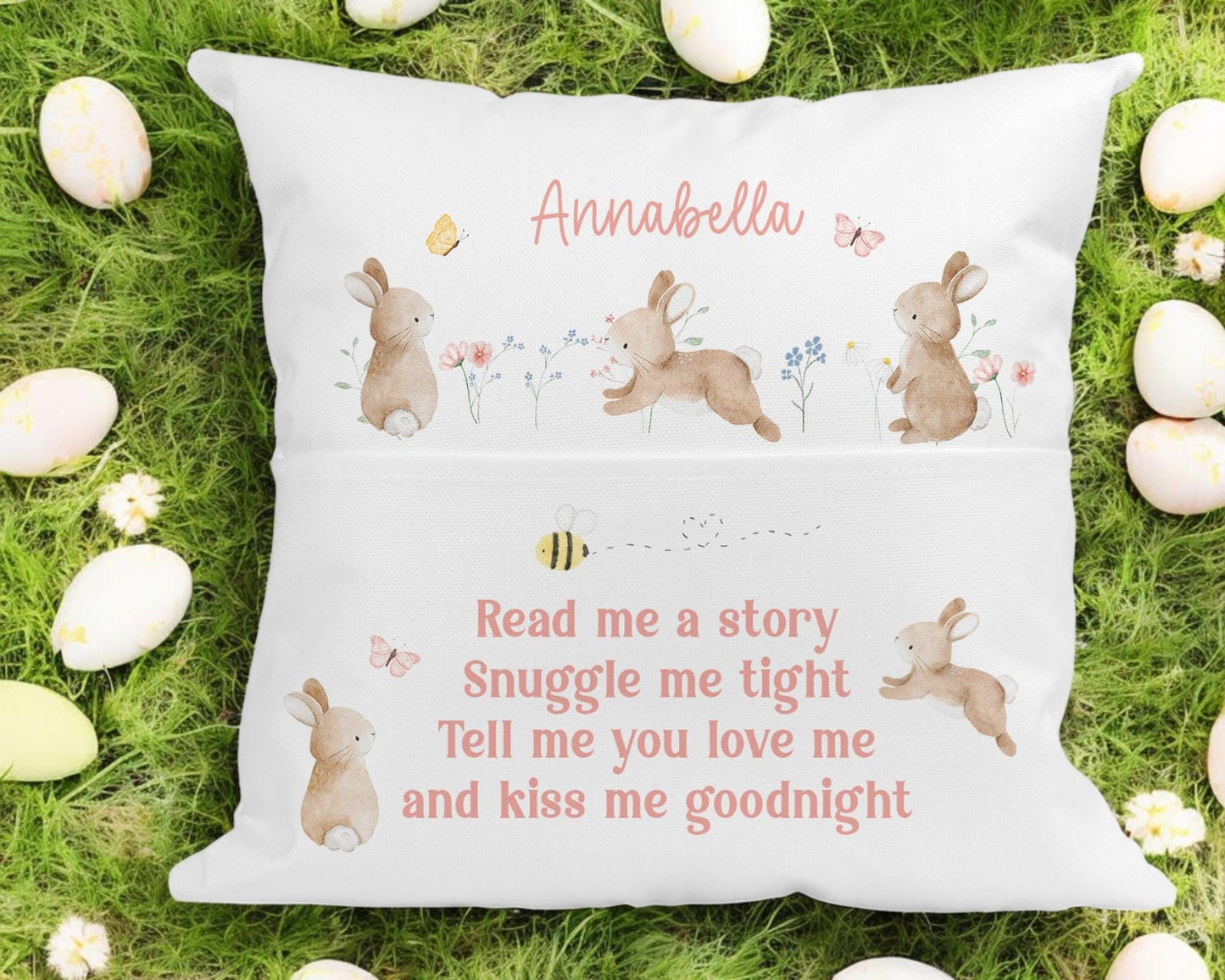 Personalised bunny book cushion with a book tucked into the front pocket, custom name Christmas gift for children