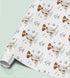 Personalised Jack Russell Terrier birthday wrapping paper featuring a cute dog, custom name and birthday message with paw prints and dog toys.