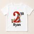 A white t-shirt with a red number "2" and a cartoon pirate character holding a pirate flag. The text "Ryan" is also displayed below the number.