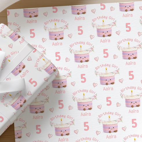 Personalised pink birthday wrapping paper with cute cake design, custom age and name gift wrap for girls birthdays.