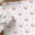 Personalised pink birthday wrapping paper with cute cake design, custom age and name gift wrap for girls birthdays.