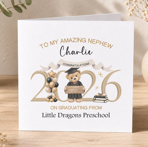 The image is a graduation card for Charlie, who has graduated from Little Dragons Preschool.