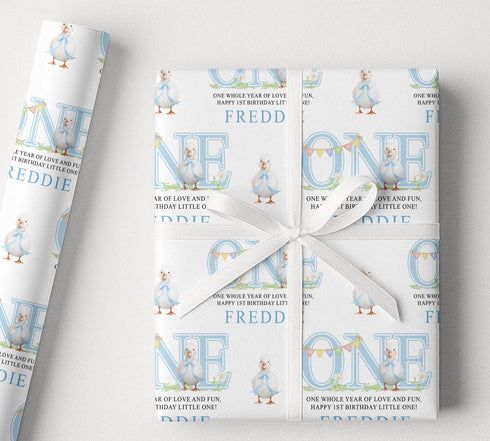 Personalised blue duck first birthday wrapping paper with custom name, one birthday theme, pastel blue design and cute duck illustrations.