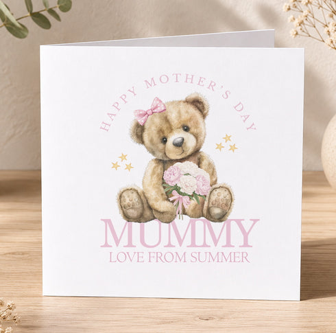 A greeting card with a teddy bear holding flowers and the text "Happy Mother's Day Mummy Love from summer" printed on it.