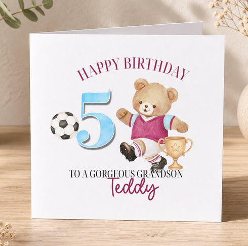 A birthday card with a teddy bear wearing a soccer uniform and a trophy, celebrating a 5-year-old's birthday.