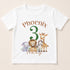 A white t-shirt with a graphic design featuring a group of cartoon animals, including a lion, giraffe, elephant, and zebra, along with the text "Phoenix 3 Today".