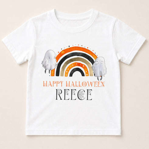 A white t-shirt with a Halloween-themed graphic design featuring two ghostly figures and a rainbow. The text on the t-shirt reads "Happy Halloween" and "Reece".