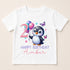 A white t-shirt with a cartoon penguin and colorful balloons, along with the text "2 HAPPY BIRTHDAY AMBER" printed on it.