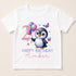 A white t-shirt with a cartoon penguin holding balloons and surrounded by butterflies, along with the text "2 HAPPY BIRTHDAY AMBER".