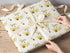 Personalised bee first birthday wrapping paper with cute honey bee design and custom name for a boy or girl turning one.