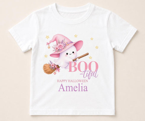 Personalised Boo-tiful Halloween t-shirt featuring cute ghost wearing pink witch hat, flying on broomstick and custom name on white children's Halloween shirt