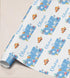 The image is a roll of wrapping paper with a repeating pattern of the name "Olivier" and various sea creatures, such as fish and octopuses, printed on it.