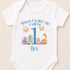 A white baby onesie with a personalized text and illustrations on it.