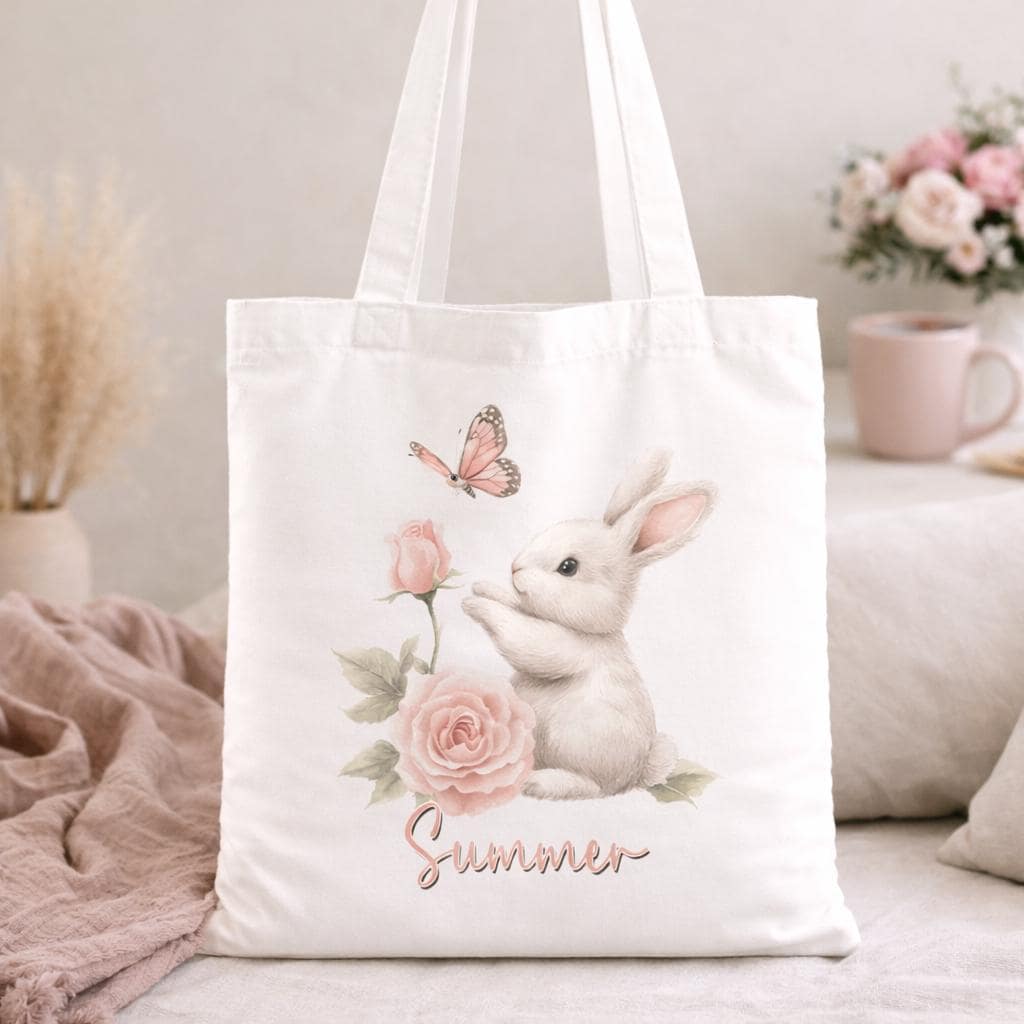 Cotton canvas tote bag printed with a spring bunny and floral design, personalised with a custom name