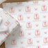 Personalised butterfly 1st birthday wrapping paper with floral pink number one design and custom name for girls.