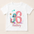 A white t-shirt with a mermaid character and the number 6 printed on it, along with bubbles and a starfish. The text "Hailey" is also printed below the mermaid character.