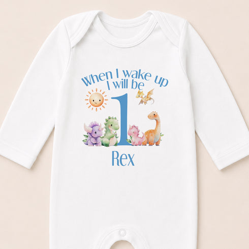 A white onesie with a personalized text and illustrations on it.