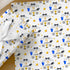 Personalised football birthday wrapping paper with custom name and age, football themed gift wrap featuring footballs, trophy, boots and shirt.