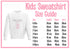 a white sweatshirt with a pink design on it